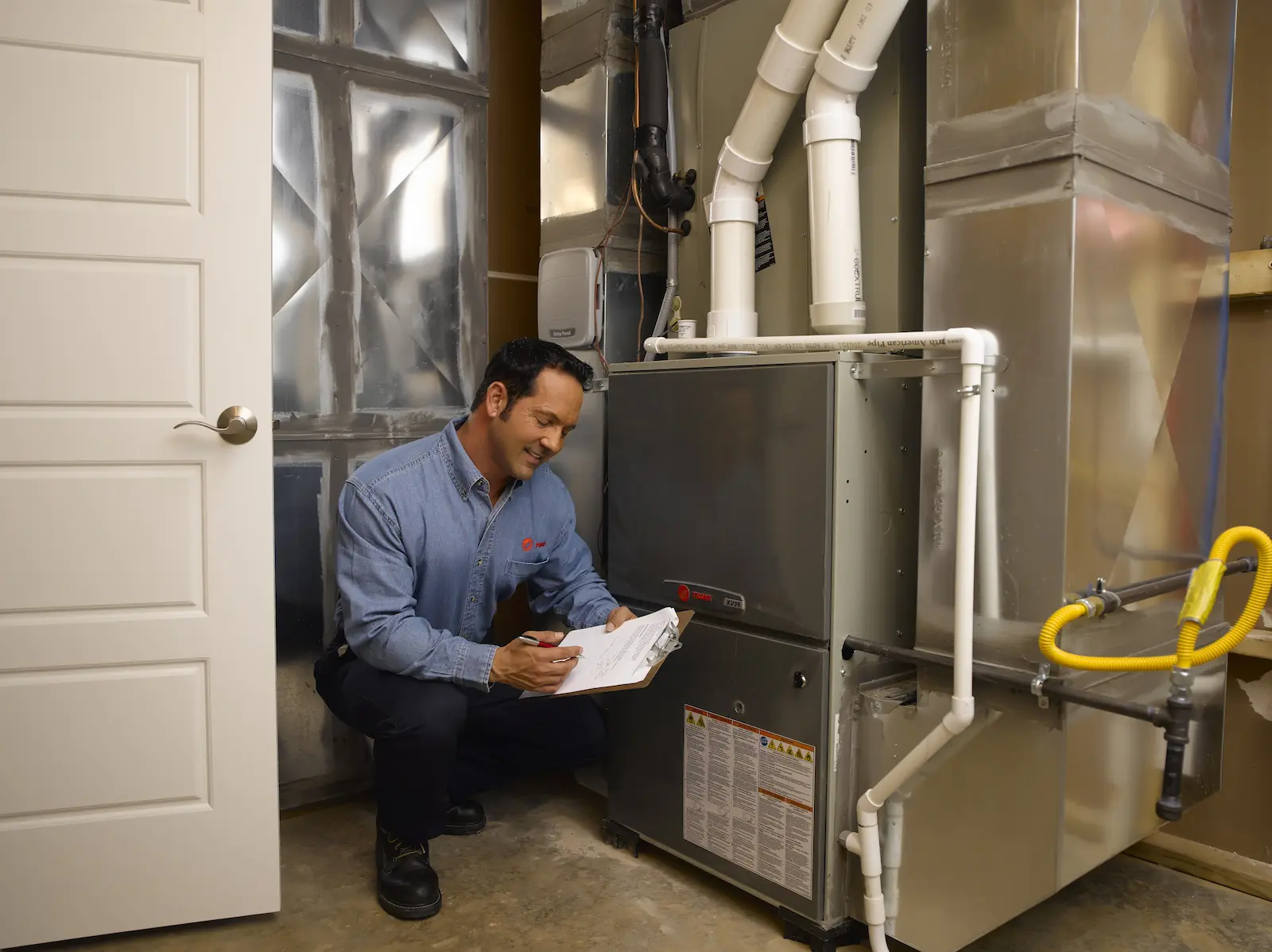 Expert technician performing Best AC Repair Las Vegas service on a residential cooling system.